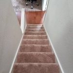 staircase with rose carpet